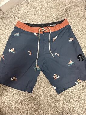 VISSLA Navy Swim Shorts with Rust Waistband and Surf Print
